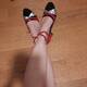 Gambe incrociate scarpe